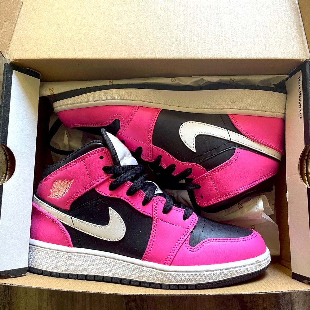 Jordan’s mids pink, black and white